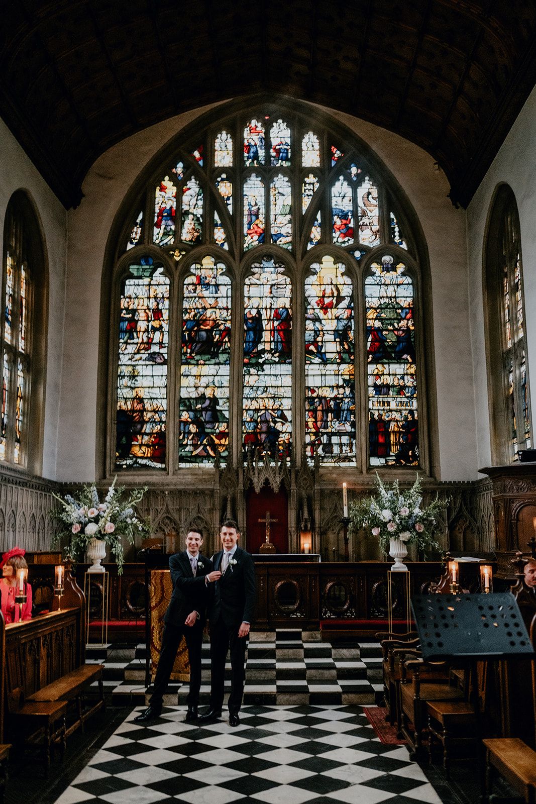 James and his best man stood facing the camera in front of the alter at Wadham College Chapel, part of the University of Oxford. Photo thanks to Matt Fox Photography.