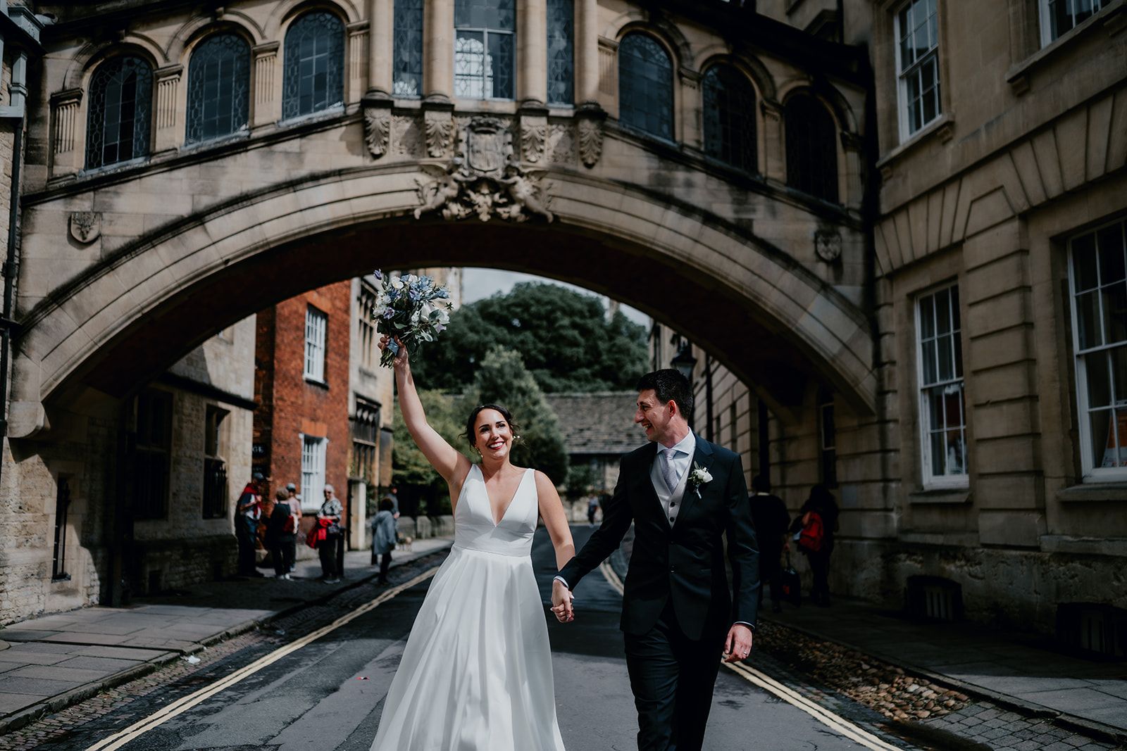 Adrianna and James stood in front of the Bridge of Sighs (Hertford Bridge) in the City of Oxford. Photo thanks to Matt Fox Photography.