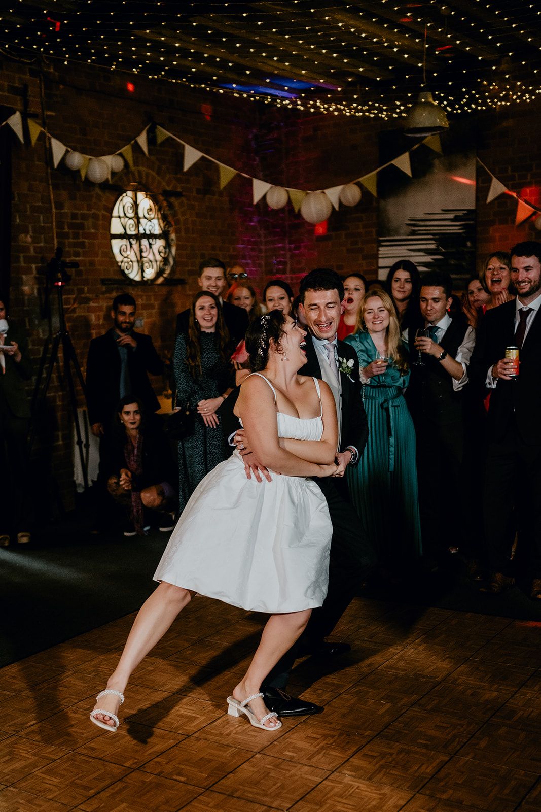 James and Adrianna doing their choreographed first dance in the lower boathouse at Cherwell Boathouse in Oxford. Photo courtesy of Matt Fox Photography.